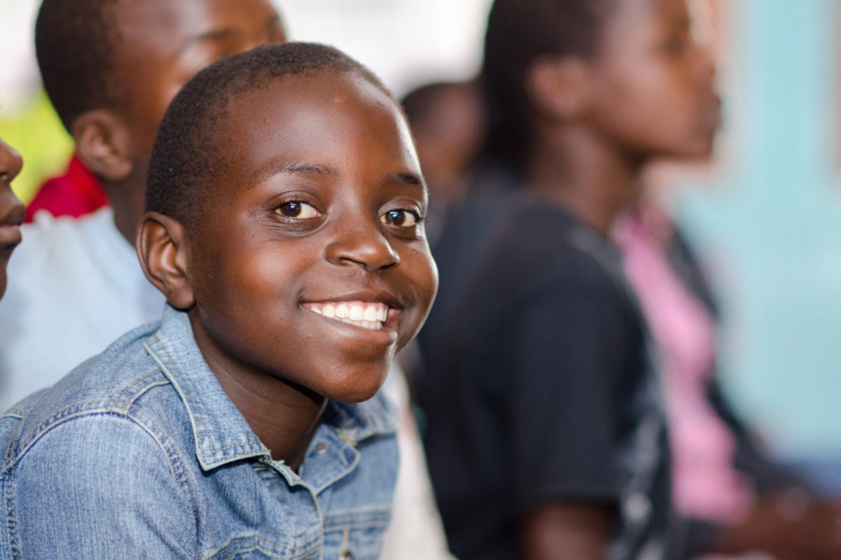 Portrait of a smiling school boy. Photo by Rob Hammond